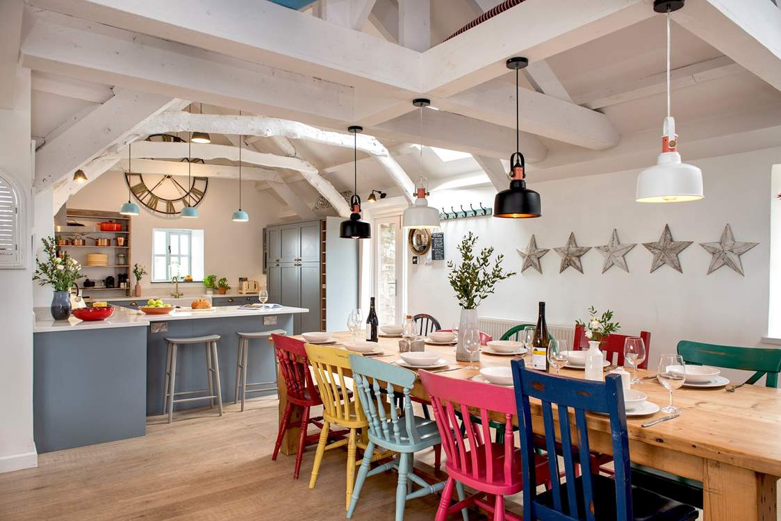 The dining-table sits next to the kitchen-area, which makes it really easy when serving up.