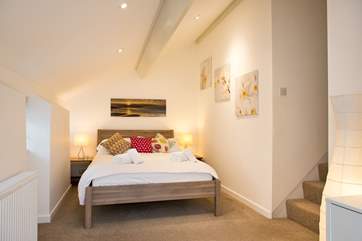 Bedroom 1 is a really delightful room and has steps leading up to the en suite.