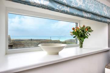 There are lovely sea views from the sitting-area window.