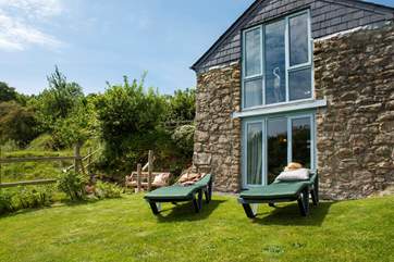 Relax on the loungers as you listen to the sounds of the countryside