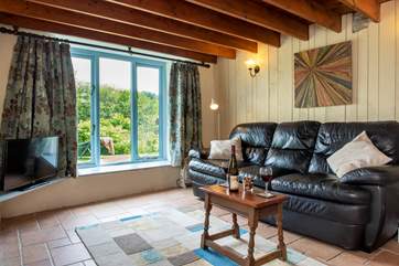 The sitting-room is the perfect place to unwind and relax.