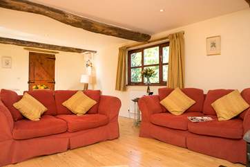 The comfortable sitting-room is very spacious.