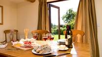 The patio doors lead out from the kitchen/dining-room to the garden.
