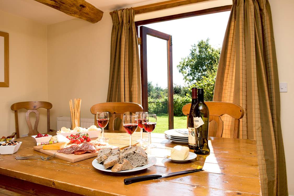 The patio doors lead out from the kitchen/dining-room to the garden.