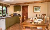 The lovely kitchen/dining-room makes for sociable dining. - Thumbnail Image