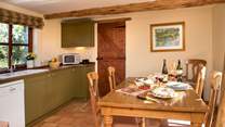 The lovely kitchen/dining-room makes for sociable dining.