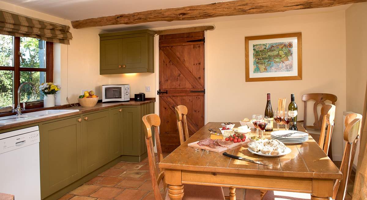 The lovely kitchen/dining-room makes for sociable dining.