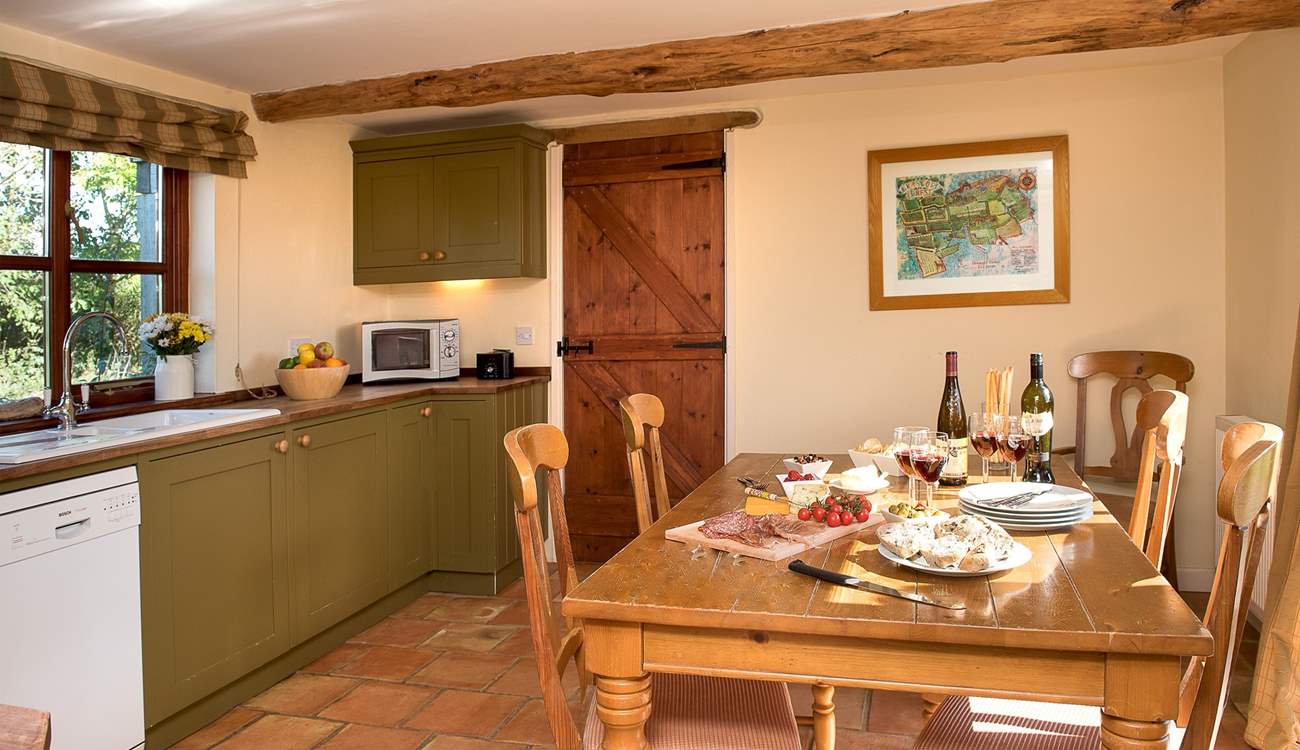 The lovely kitchen/dining-room makes for sociable dining.