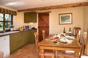 The lovely kitchen/dining-room makes for sociable dining.