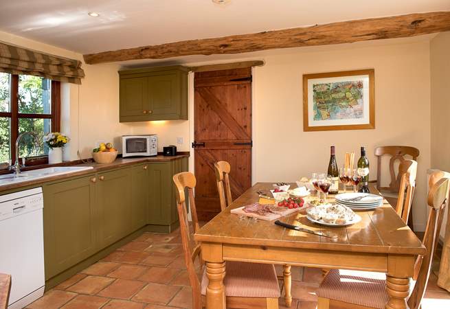 The lovely kitchen/dining-room makes for sociable dining.