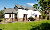 The garden at the back of Grenlecotte Cottage. Grascott Cottage is the other side of the wall to the right. - Thumbnail Image