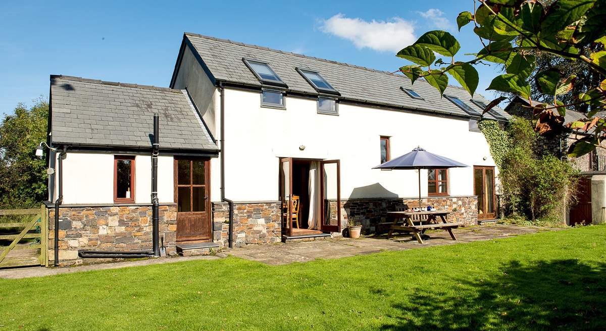 The garden at the back of Grenlecotte Cottage. Grascott Cottage is the other side of the wall to the right.