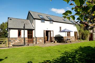 The garden at the back of Grenlecotte Cottage. Grascott Cottage is the other side of the wall to the right.