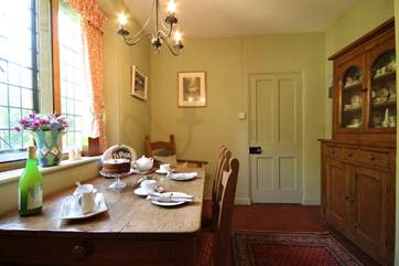 The dining-room has a lovely dresser, perfect furniture for this lovely room.