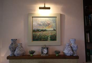Enjoy the work of local artists and potters that has its place in this special property