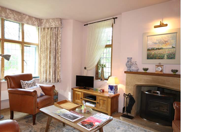 The truly comfortable sitting-room with its wood burning stove is at the heart of this lovingly presented cottage.