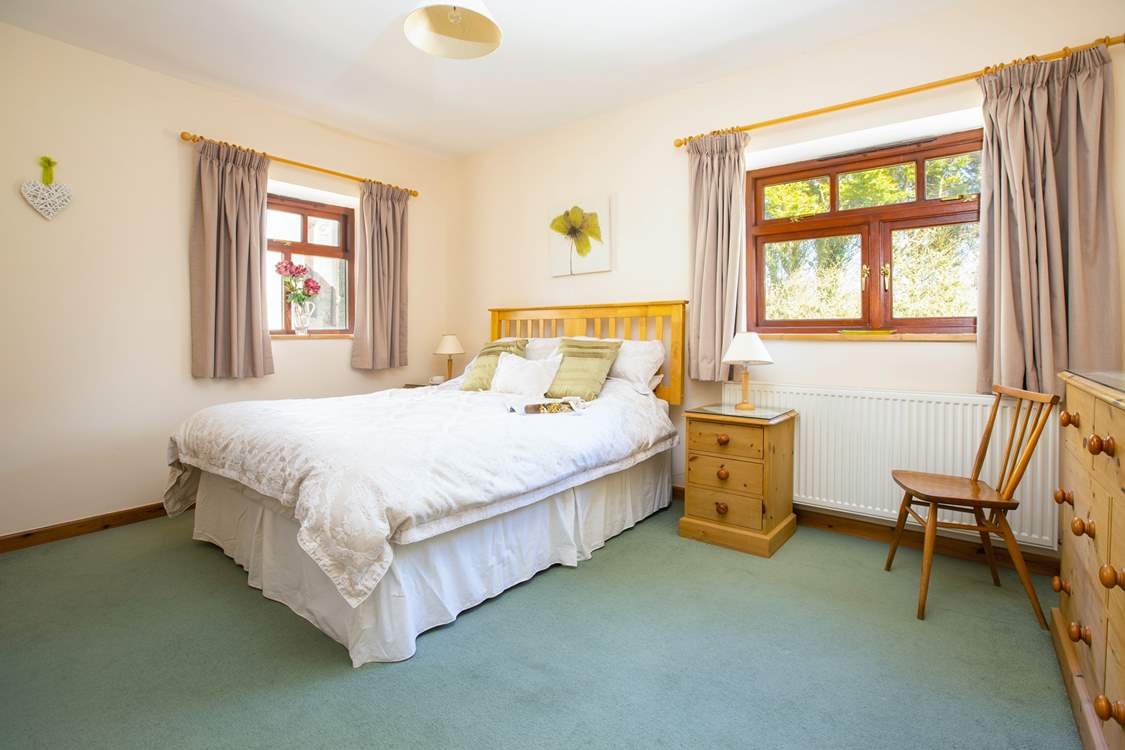 Spacious, dual aspect bedroom 1.