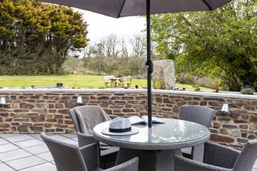 Enjoy relaxing on the terrace overlooking your private garden - enjoy the apples on the trees in the autumn.