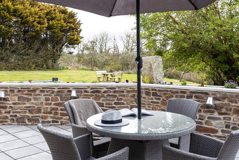 Enjoy relaxing on the terrace overlooking your private garden - enjoy the apples on the trees in the autumn. 
