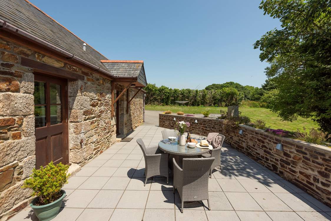 The patio overlooks your large lawn area.