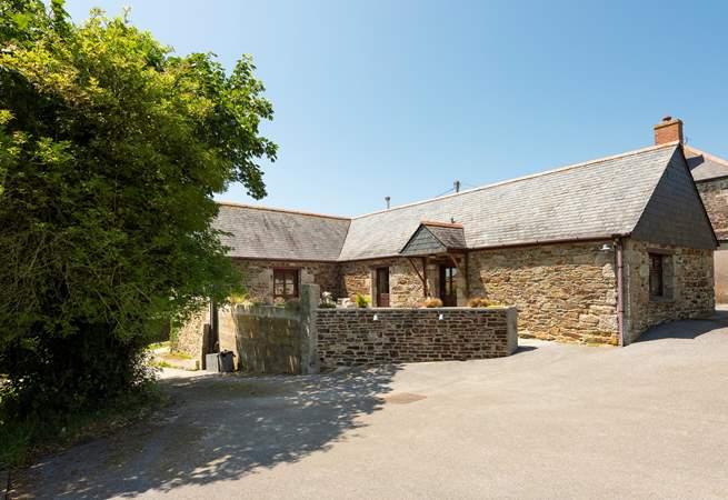 Springfield Cottage has a large garden, sheltered patio, and ample parking. 