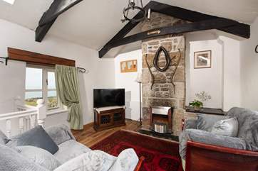 The cosy sitting/dining room is on the first floor.
