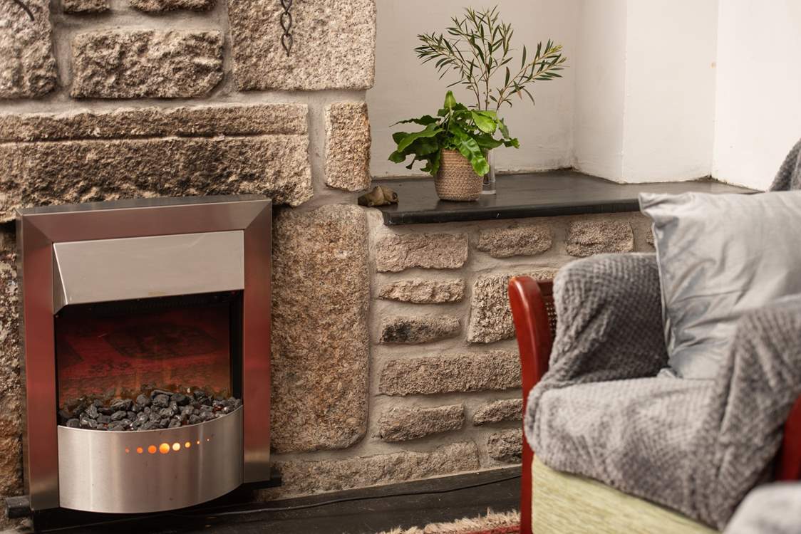 The electric effect fire will keep you warm.