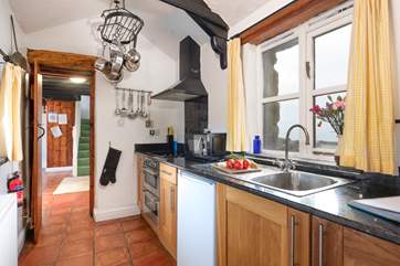 The galley kitchen is the perfect place to create a culinary masterpiece.