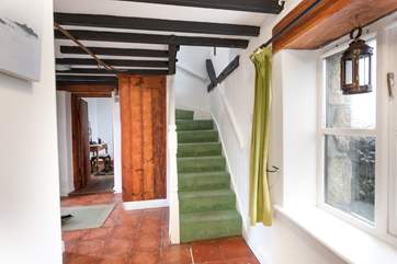 The bedroom, bathroom and kitchen are on the ground floor.