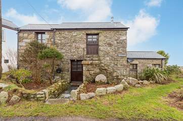 Surrounded by beautiful countryside and with views towards the Atlantic, Bos Arvorek is a characterful holiday retreat.