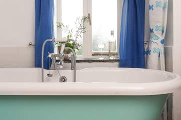 The bath has a handy shower attachment.