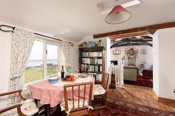 The first floor living space is cosy and bursting with character.