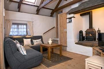 The sitting-area has a lovely multi-burner, making this an ideal retreat whatever the weather.