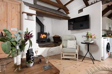 The sitting-area has a lovely multi-burner, making this an ideal retreat whatever the weather.