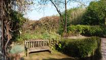 There is a pretty, enclosed place to sit at the front of the cottage too.