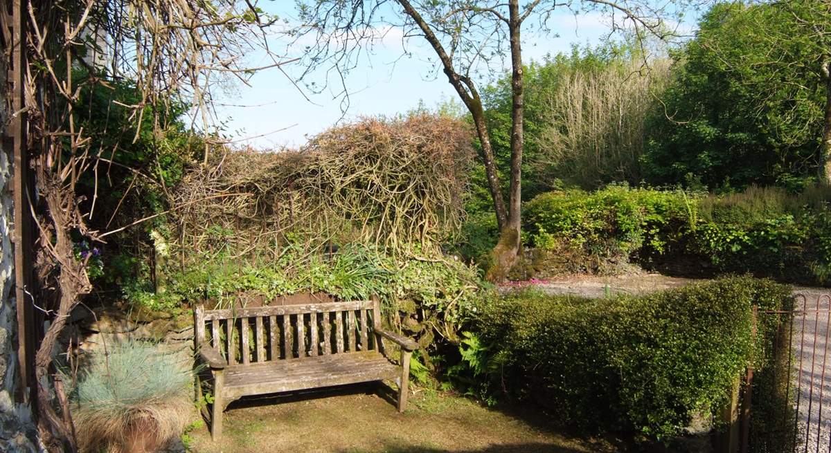 There is a pretty, enclosed place to sit at the front of the cottage too.