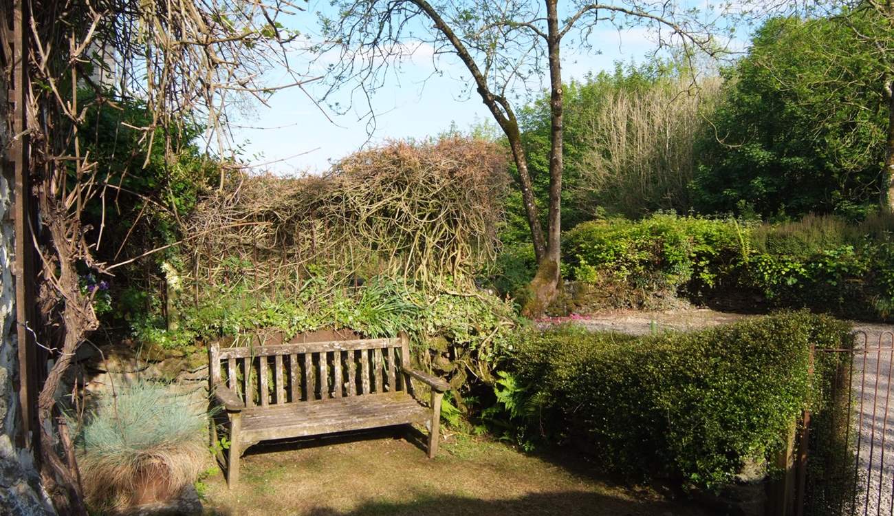 There is a pretty, enclosed place to sit at the front of the cottage too.