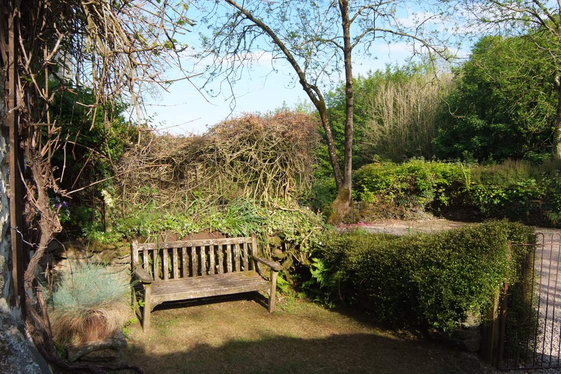 There is a pretty, enclosed place to sit at the front of the cottage too.