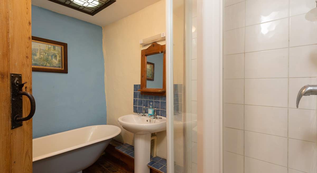 The bathroom, also on the first floor, offers an original roll-top bath as well as a shower cubicle.