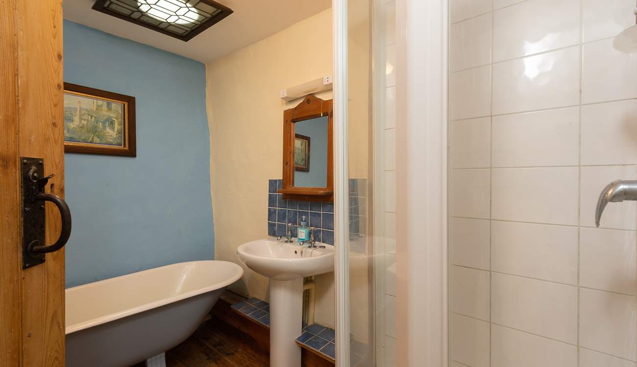 The bathroom, also on the first floor, offers an original roll-top bath as well as a shower cubicle.