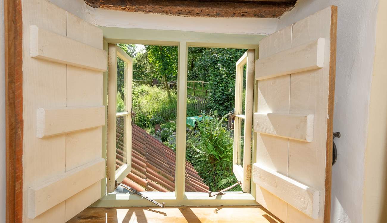 A little window on the landing looks out over the garden.