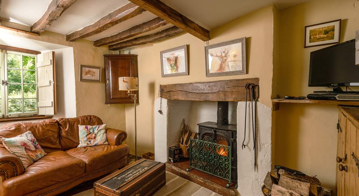 Another view of the living space. Wooden shutters ensure the cosiest stay even out of season.