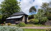 This detached cottage has its own garden and views as far as Dartmoor in the distance. - Thumbnail Image