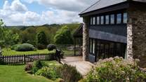 Relax on the decked terrace with superb views.