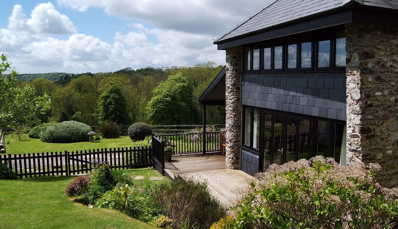 Relax on the decked terrace with superb views.