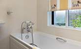 There is a bright downstairs bathroom as well as the shower upstairs. - Thumbnail Image