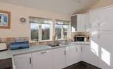 The dual-aspect kitchen makes the most of the amazing views from the cottage - all the way to Dartmoor! - Thumbnail Image