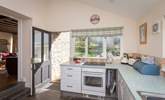 Looking across the kitchen to the garden and terrace. - Thumbnail Image