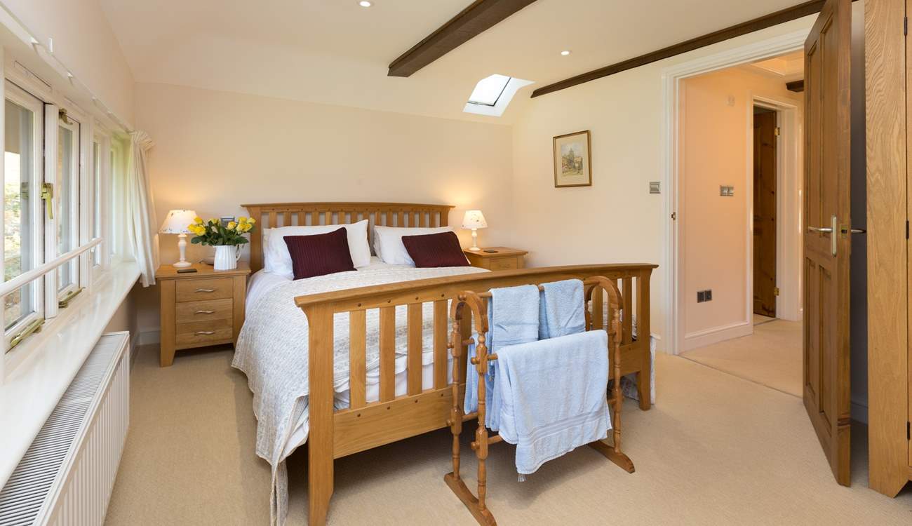 This is one of the two wonderfully sized bedrooms upstairs.