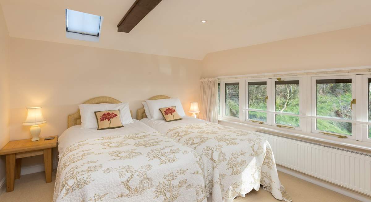 This is the second bedroom - also with a fabulous view towards the farmstead and the valley beyond it.